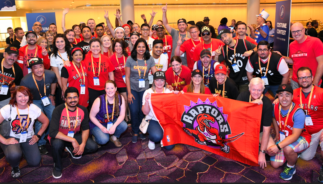 workday employees group picture with toronto rapture flag