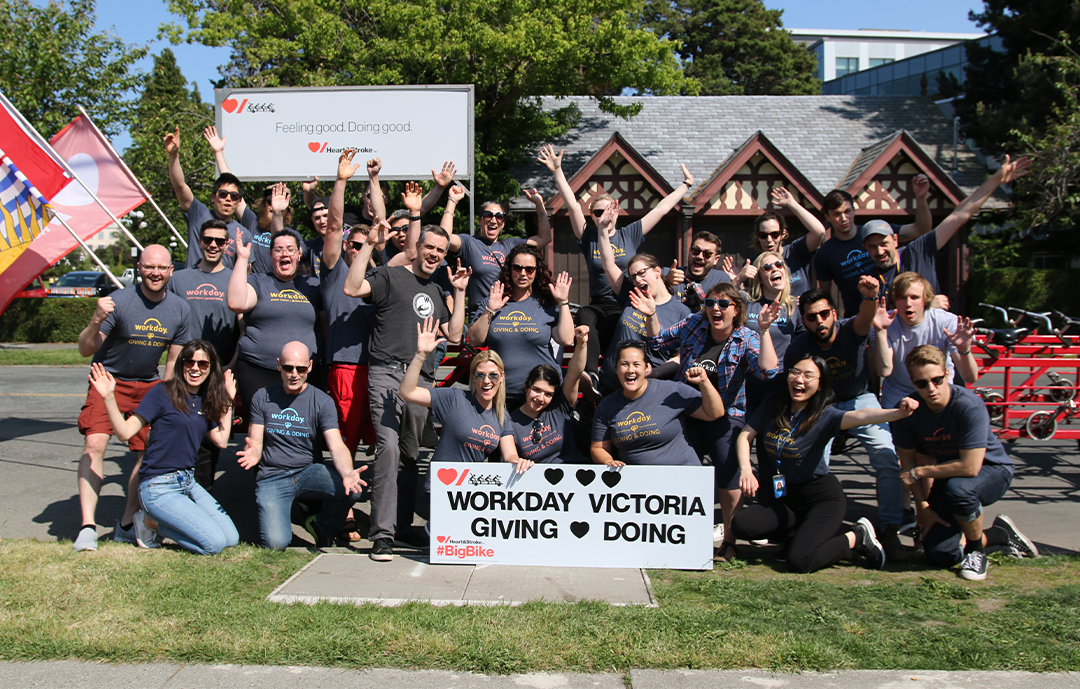 workday employees group picture with flags